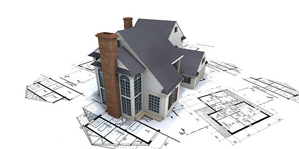 istock Residential house on top of architect blueprints 2 92371543