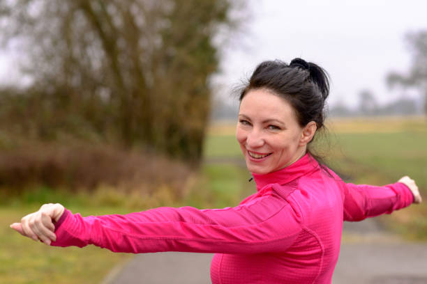 istock Pretty happy friendly woman swinging her arms 923722034