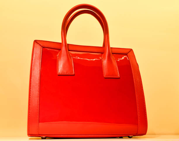 istock The red bag on the illuminated background. 923728368
