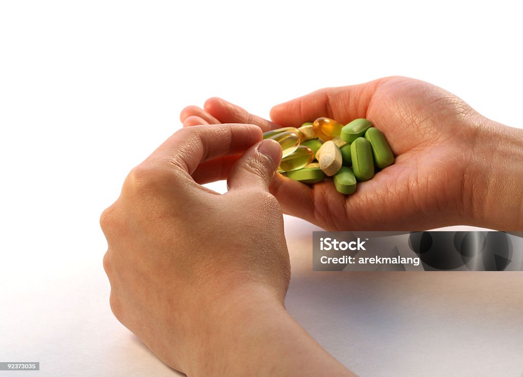 Toma vitamina - Foto de stock de Aceite de pescado libre de derechos