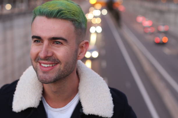 istock Trendsetter with green dyed hair smiling 923736428