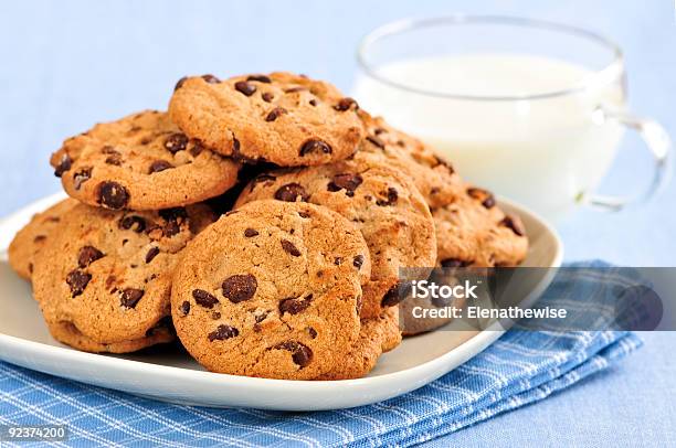 Milk And Chocolate Chip Cookies Stock Photo - Download Image Now - Baked, Bedtime, Brown