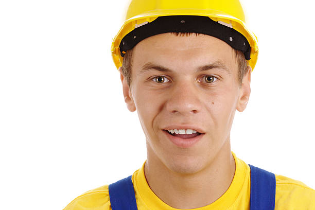 Young worker with perplexed look stock photo