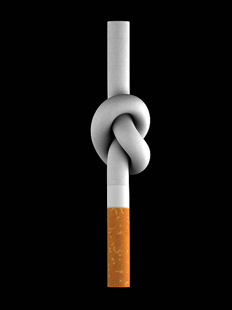 cigarette tied in a knot stock photo