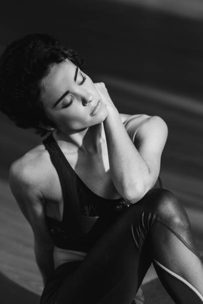 istock sportive woman relaxing after workout 923753410