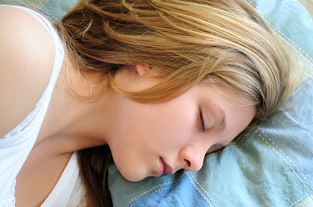 istock Teenage girl sleeping 92375408