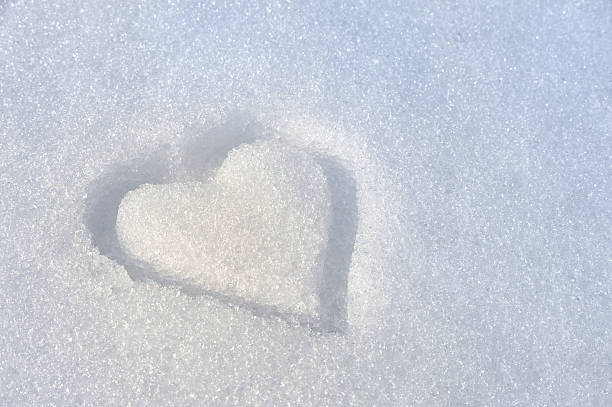 istock Heart on the snow - background 92375758