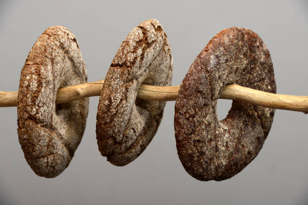 three finnish round rye bread on a neutral background