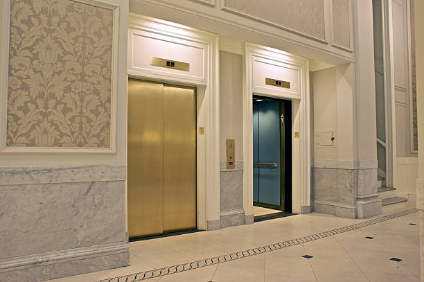 istock View of two elevators in which one is closed and other open 92376064