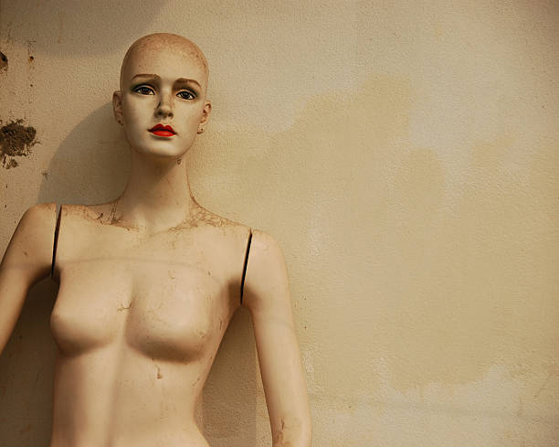 istock Female mannequin standing in front of the wall 92376123