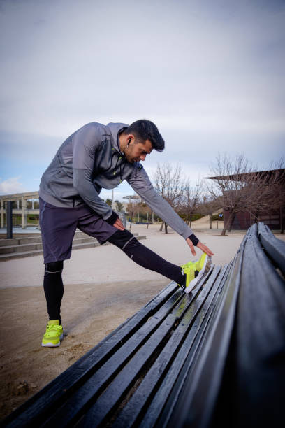 Young athlete man is doing sport runing stock photo