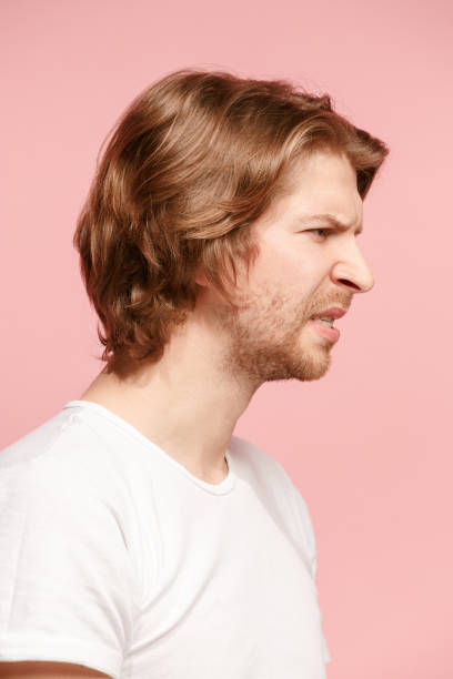 istock Young man with disgusted expression repulsing something, isolated on the pink 923766066