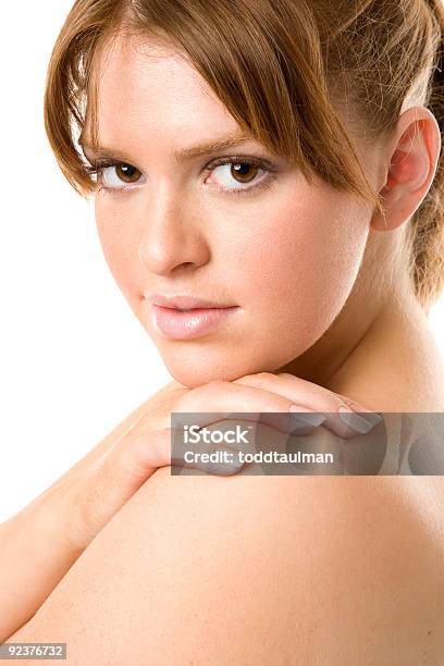 Smiling Brunette Looks Over Her Shoulder Stock Photo - Download Image Now - Adult, Adults Only, Beautiful People