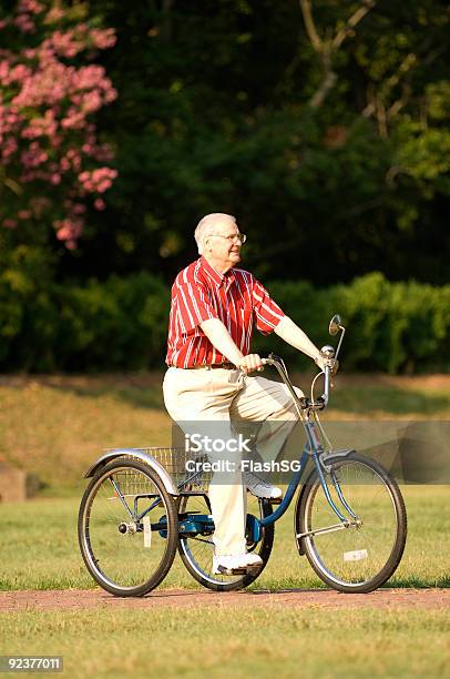 Elderly Man Taking A Ride On Bike Stock Photo - Download Image Now - 70-79 Years, 80-89 Years, Active Lifestyle