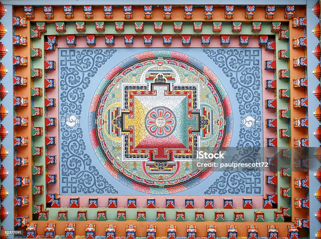 A mandala with beautiful shapes and colors The villagers of Upper Pisang, Annapurna, Nepal, decided to build a new monastery rather than renovate their old one. This Tibetan mandala has been painted on the new monastery ceiling. Tibet Stock Photo