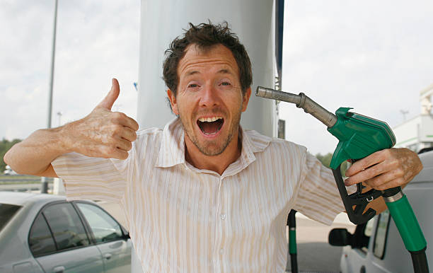 istock Man giving thumbs up getting gas 92377097