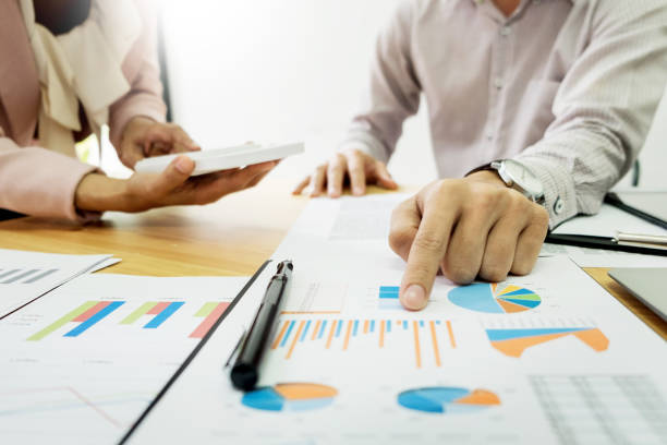 istock Close-Up Of Business People Working On Table 923773506