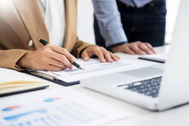 istock Midsection Of Businessmen Working On Table At Office 923775448