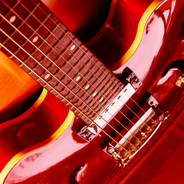 Red Electric Guitar red electric guitar, Close-up electric guitar photos stock pictures, royalty-free photos & images
