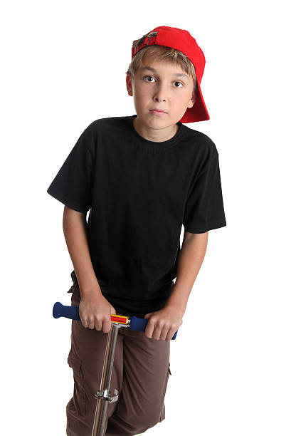 istock Child riding scooter closeup 92377713