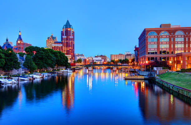 Milwaukee RiverWalk Milwaukee RiverWalk. In the heart of downtown, the two-mile long RiverWalk winds along the Milwaukee River with access to some of the city's best restaurants milwaukee wisconsin photos stock pictures, royalty-free photos & images