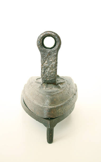 istock Collectables - Antique Sad Iron on a Trivet 92377918