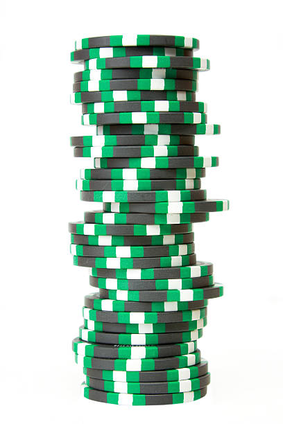 Stack of casino chips isolated over white background stock photo