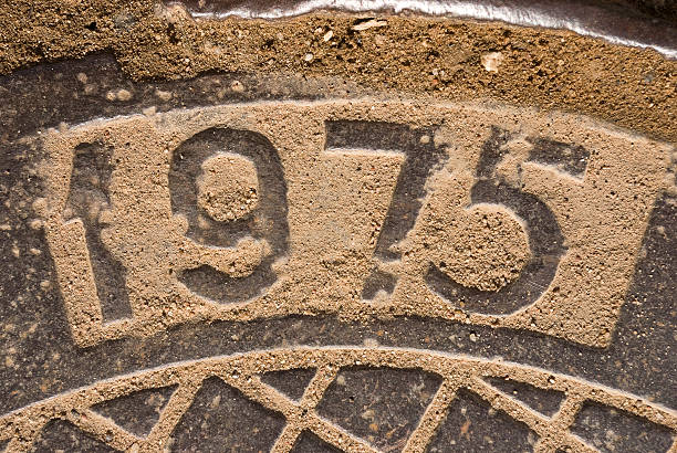 The year 1975 engraved in stone