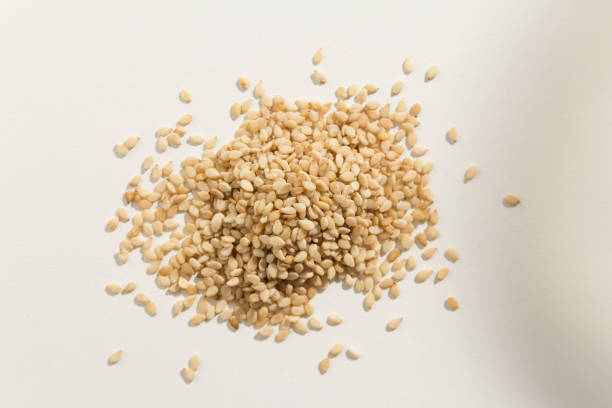 istock High Angle View Of Sesame Seeds Against White Background 923785198