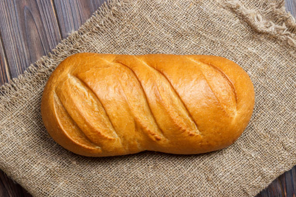 istock Close-up of traditional fresh bread. top view 923785352