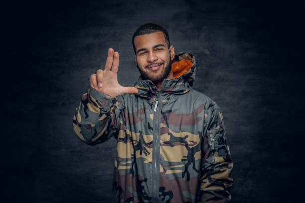 istock African American man dressed in military jacket. 923793218