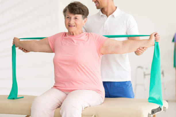 istock Elderly woman stretching during physiotherapy 923795858