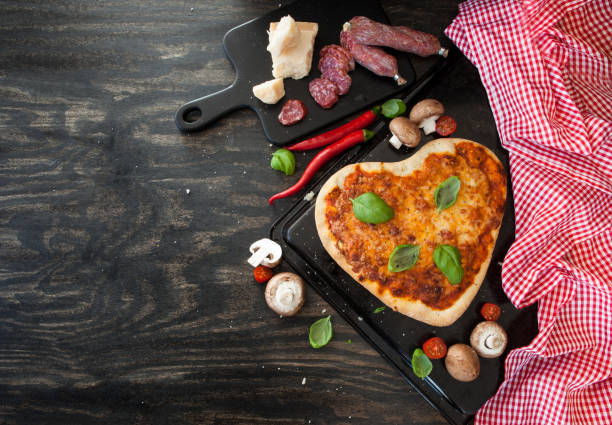 istock Pizza Margherita in a heart shape 923796344