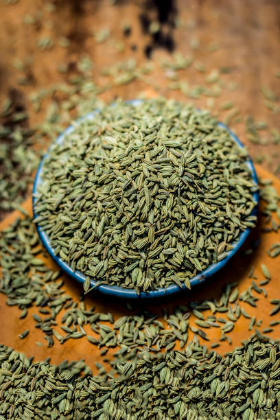 Close up of traditional mouth freshener's essential herb variyali,fennel or Foeniculum vulgare in a glass plate. stock photo