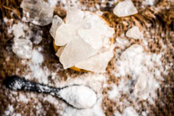 Close up of alum, potassium aluminium sulfate and soap nut,Sapindus ingredients of a traditional tooth paste for toothache and yellow teeth. Close up of alum, potassium aluminium sulfate and soap nut,Sapindus ingredients of a traditional tooth paste for toothache and yellow teeth. alumni stock pictures, royalty-free photos & images