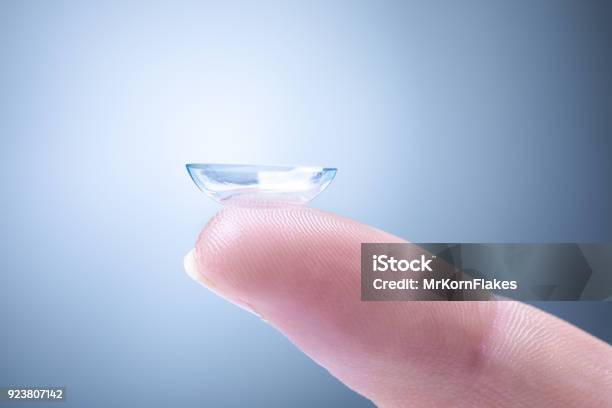 Contact Lens On A Finger Stock Photo - Download Image Now - Contact Lens, Finger, Lens - Optical Instrument