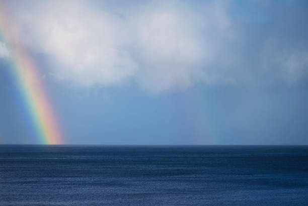istock Beautiful rainbow on the ocean horizon 923813388