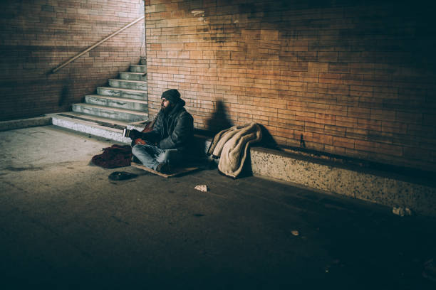 istock Young homeless man begging 923818132