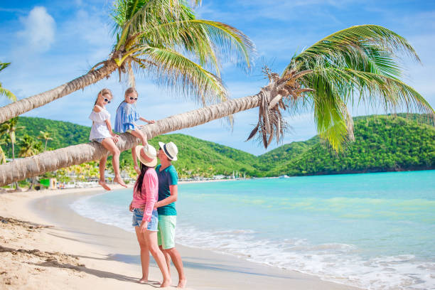 istock Happy family on beach vacation 923818518