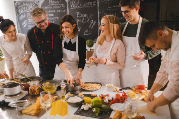 istock Team building in a cooking class with a real chef 923828088