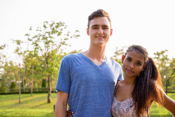 istock Mixed Race Couple In Park 923828304