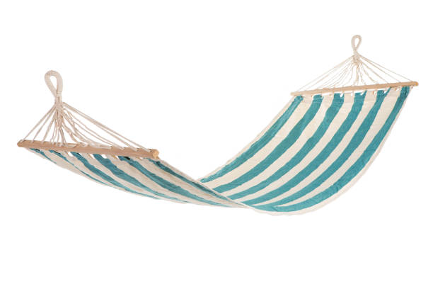 istock a multi-colored hammock made from natural fabric hanging on ropes, white background 923831838