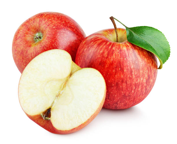 istock Ripe red apples with half and apple leaf isolated on white 923832604