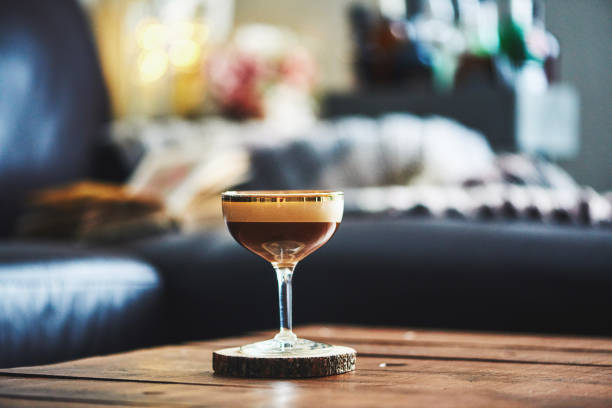 istock Espresso martini cocktail on coffee table in indoor setting 923845178