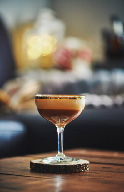istock Espresso martini cocktail on coffee table in indoor setting 923845182
