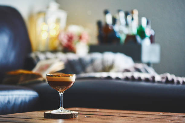 istock Espresso martini cocktail on coffee table in indoor setting 923845348