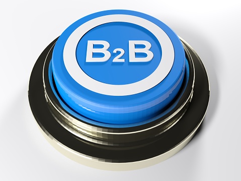 A blue push button with the write B 2 B on its top: Business to Business - 3D rendering illustration