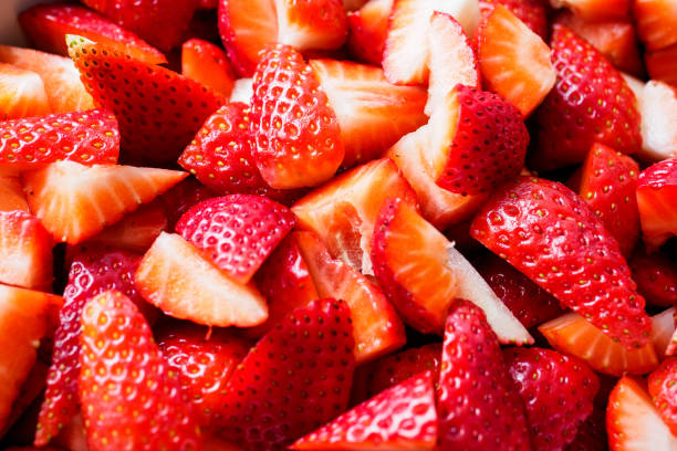 istock Red strawberries in a white bowl. 923859210