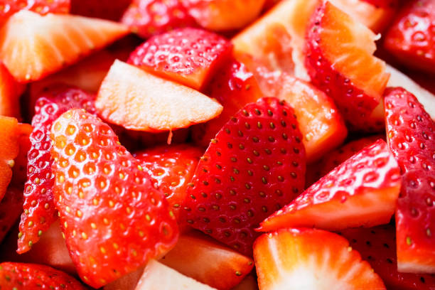 istock Red strawberries in a white bowl. 923861962