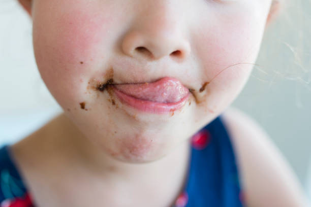 Children's mouth with chocolate